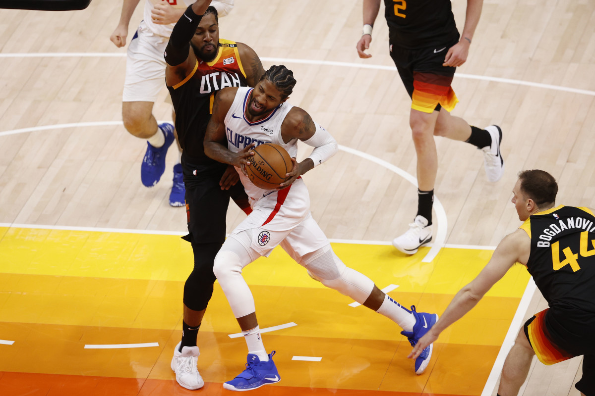 Jun 8, 2021; Salt Lake City, Utah, USA; LA Clippers guard Paul George (13) drives to the hoop against Utah Jazz center Derrick Favors (15) in the fourth quarter during game one in the second round of the 2021 NBA Playoffs. at Vivint Arena. Mandatory Credit: Jeffrey Swinger-USA TODAY Sports